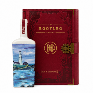 Heaven’s Door Bootleg Vol. IV lighthouse bottle with red presentation case on a square white background